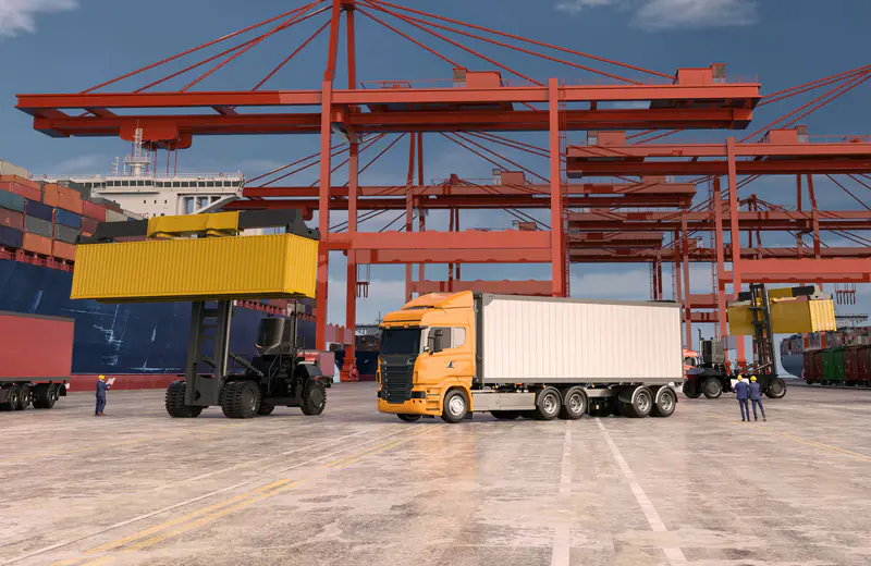 Terminal de contenedores con una grúa pórtico y un buque
